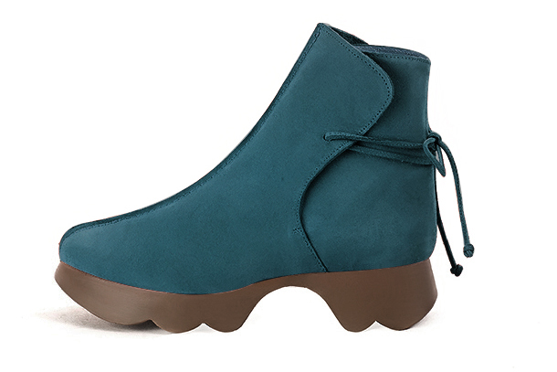 French elegance and refinement for these peacock blue dress booties with laces at the back, 
                available in many subtle leather and colour combinations. This charming ankle boot with its back lacing fits snugly around the ankle.
Its rubber sole ensures comfort and originality.
Customise or not, with your choice of materials and colours.  
                Matching clutches for parties, ceremonies and weddings.   
                You can customize these lace-up ankle boots to perfectly match your tastes or needs, and have a unique model.  
                Choice of leathers, colours, knots and heels. 
                Wide range of materials and shades carefully chosen.  
                Rich collection of flat, low, mid and high heels.  
                Small and large shoe sizes - Florence KOOIJMAN